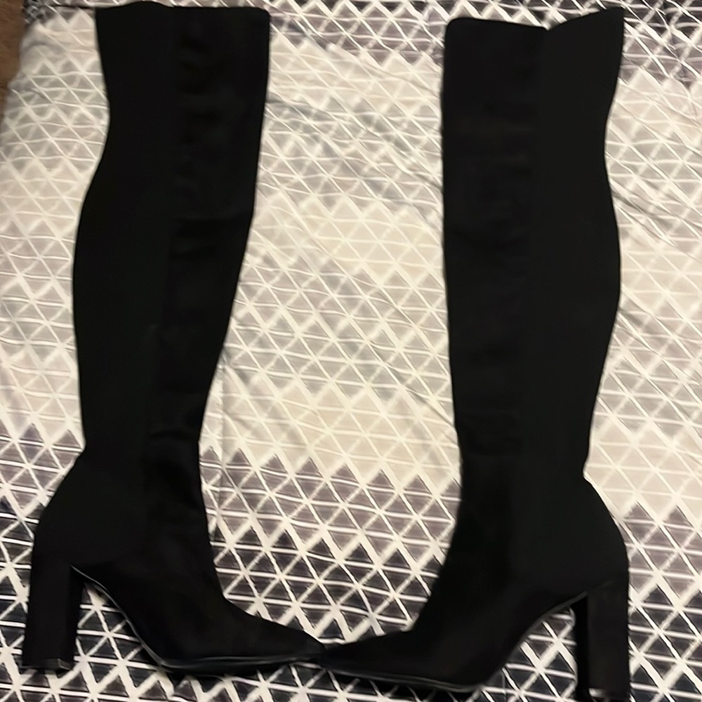 Women’s black thigh high boots 7.5.
